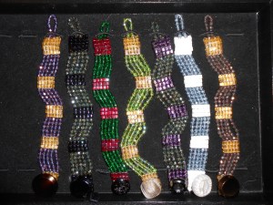 Beaded bracelets and ribbon necklaces.  These items will be available at Local Discoveries at 16th & Alberta.